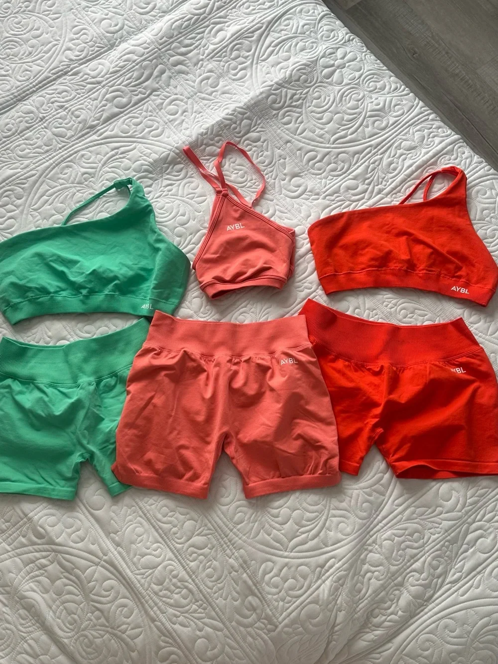 AYBL Activewear Trio — Green, Coral, and Red Matching Sets